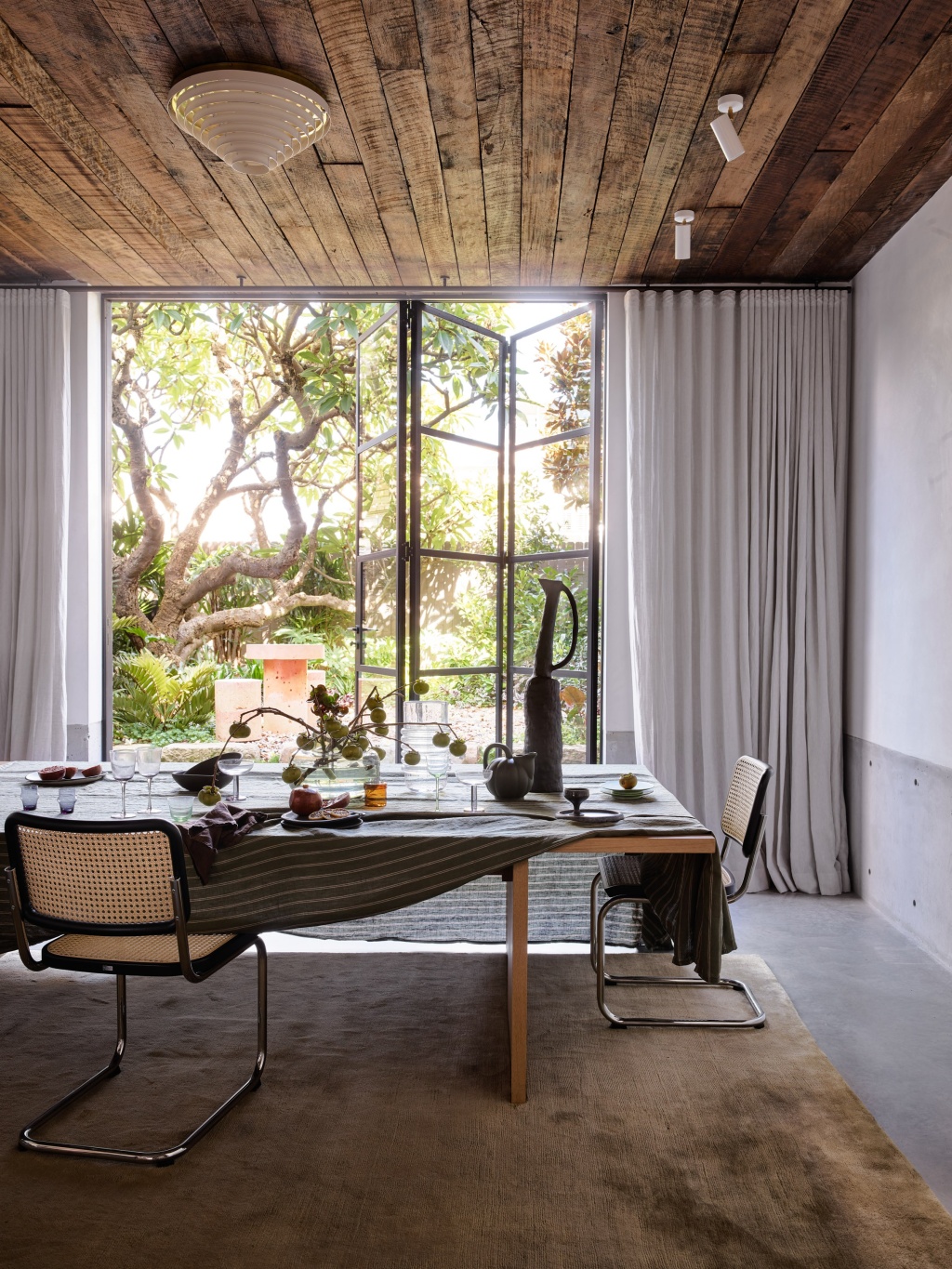 Alexander House Dining Table with Garden View.