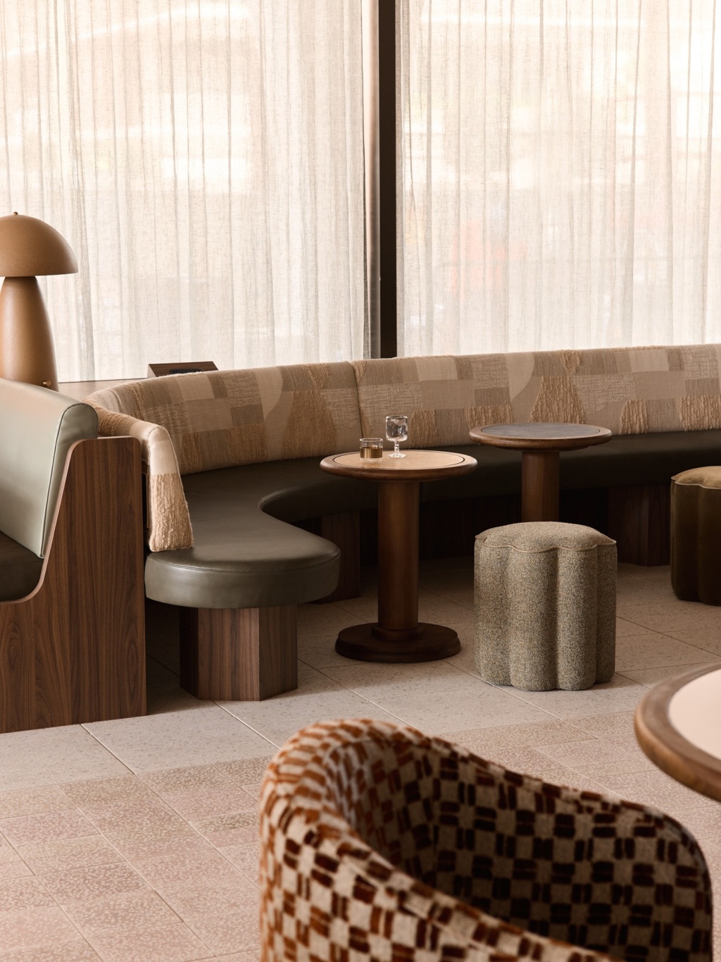 Cream and sage banquette seating at Lito lobby bar.